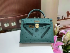 Hermès Kelly 28 teal blue ostrich leather handbag gold hardware