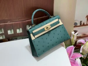Hermès Kelly 25 teal blue ostrich leather handbag gold hardware with top handle