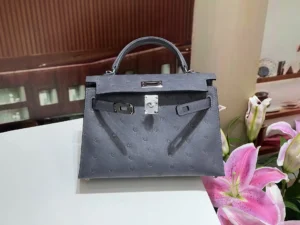 Hermes Kelly 28 gray ostrich leather handbag with silver hardware and top handle