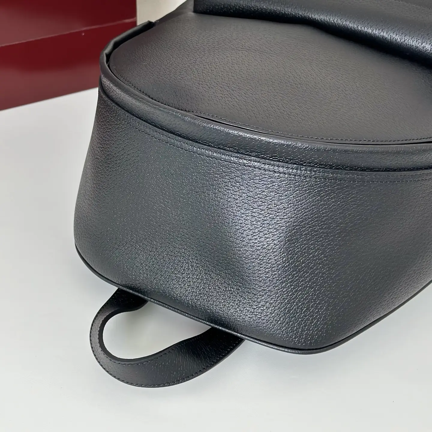 Hermes Roulis small black leather crossbody bag pebbled leather with flap closure and leather loop handle