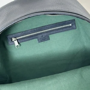 Gucci backpack interior dark green fabric lining black leather trim zip pocket