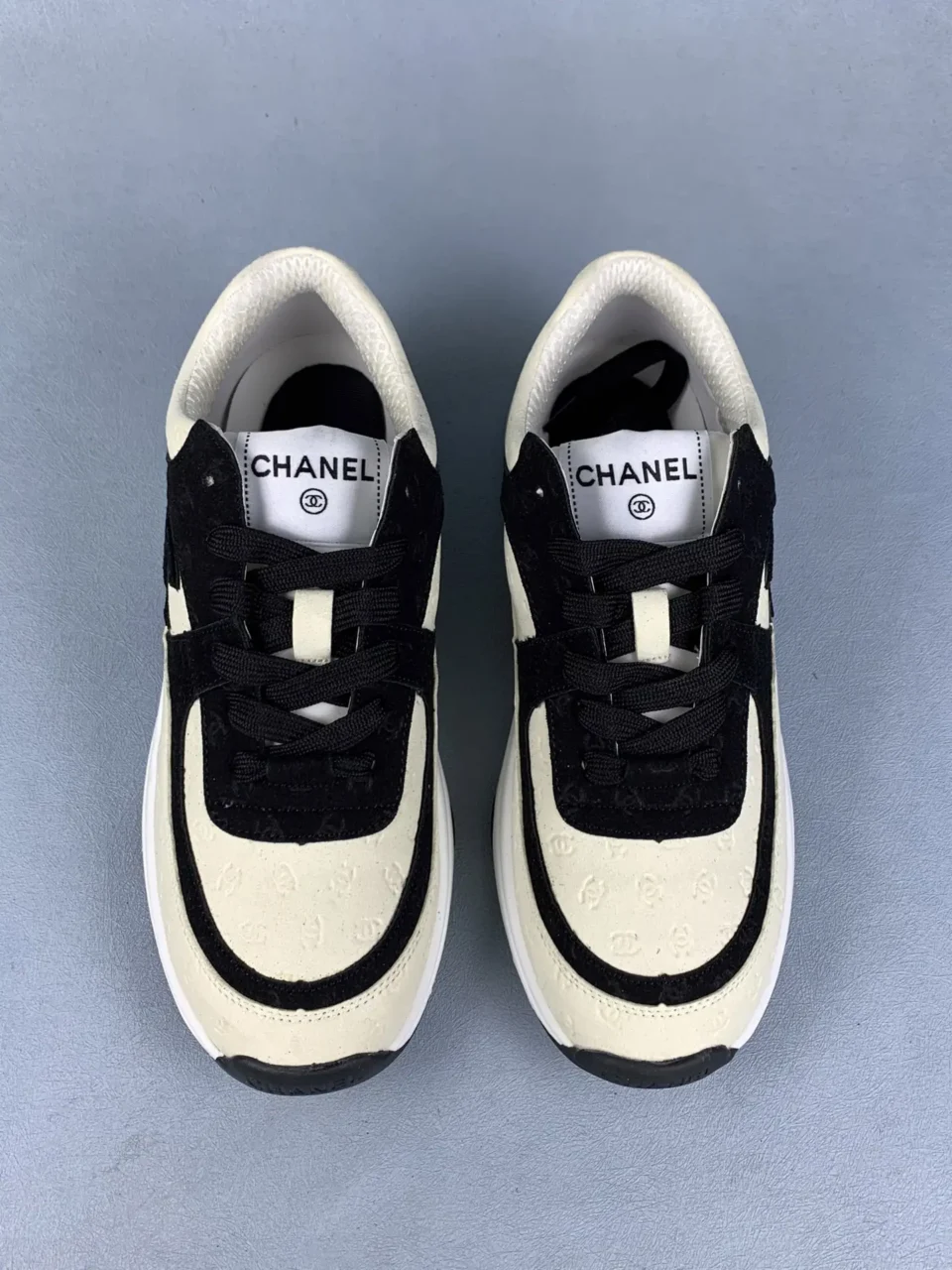 Chanel sneakers cream black colorway embossed leather with suede accents lace-up design