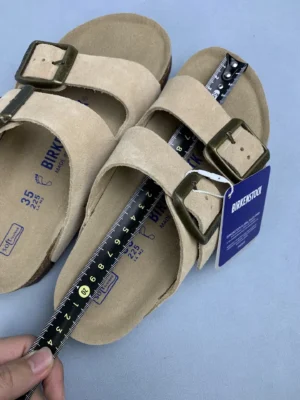 Birkenstock Arizona sandals beige suede adjustable straps cork footbed sandals