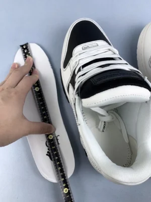 Nike Air Jordan 1 High OG black white leather sneakers with removable insole and detailed stitching