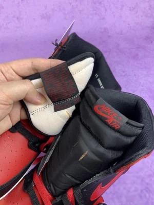 Nike Air Jordan 1 Retro High OG Chicago red white black leather sneakers with red laces