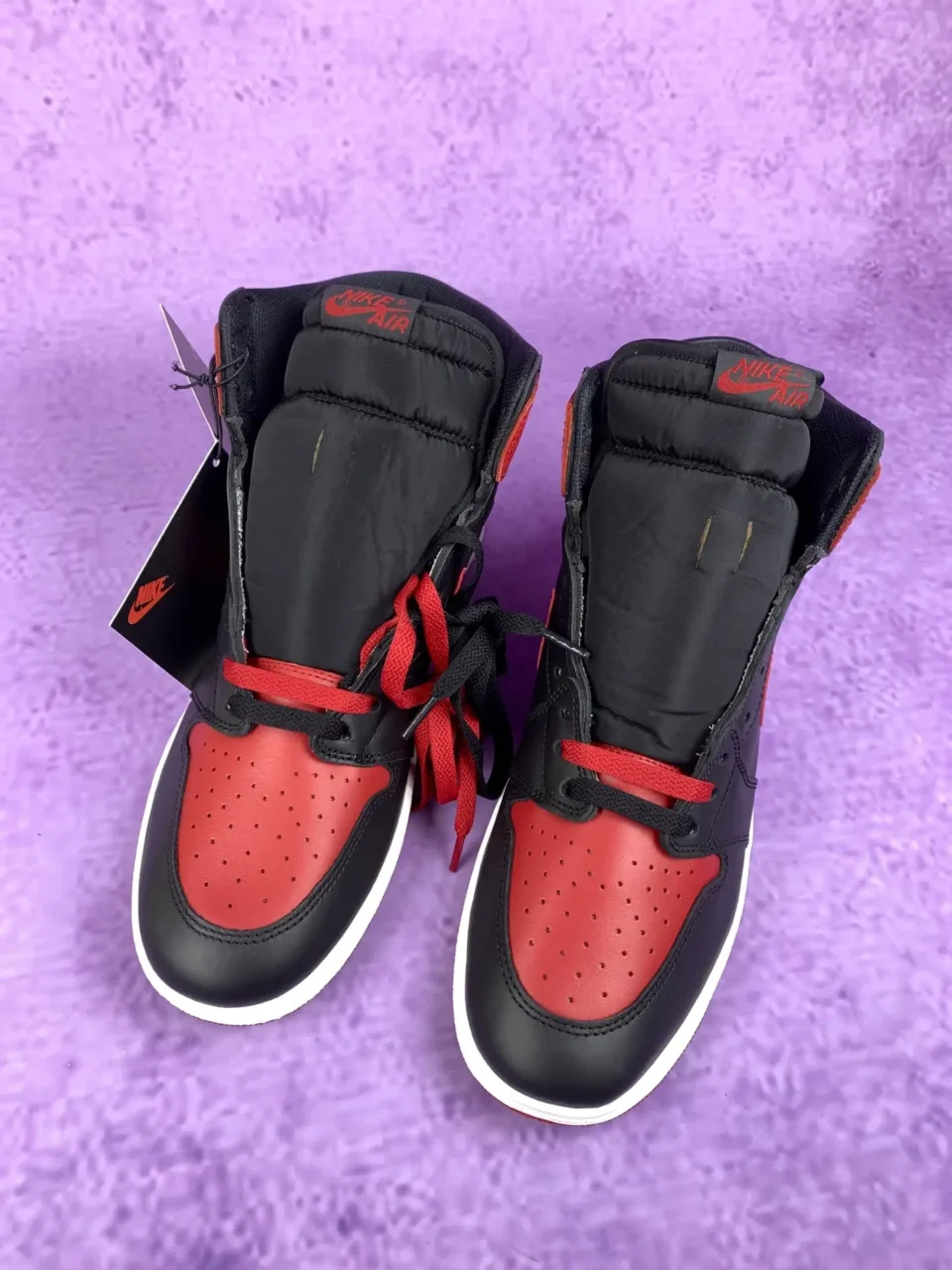 Nike Air Jordan 1 High OG Bred black red leather sneakers with black and red laces and white sole