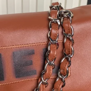 Chanel Classic Flap Medium A01112 cognac brown leather bag with silver chain strap