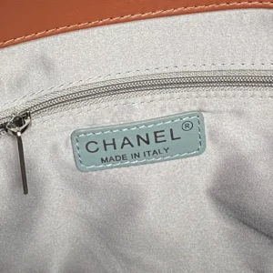 Chanel bag interior label made in Italy beige fabric with tan leather trim and silver zipper pull