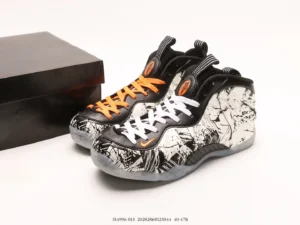 Nike Air Foamposite One Black White Orange splattered leather sneakers with translucent sole