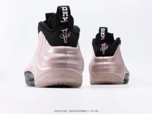 Nike Air Foamposite One DMV pink black metallic leather sneakers from rear view