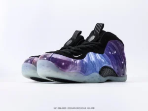 Nike Air Foamposite One NRG sneakers featuring a galaxy-inspired design with purple and blue hues, showcasing a sleek silhouette and a black upper.