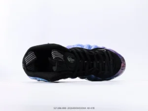 Nike Air Foamposite One NRG sneakers featuring a black upper with a gradient blue and purple outsole, showcasing a unique design ideal for sneaker enthusiasts and replica product shoppers.