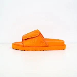 Louis Vuitton Miami Damier Round Head One Word Slippers in vibrant orange, showcasing luxury footwear design with embossed logo and adjustable strap.