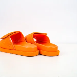 Louis Vuitton Miami Damier Round Head One Word Slippers in vibrant orange, showcasing luxury design and high-quality materials, ideal for summer wear.