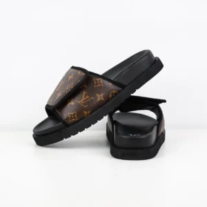 Louis Vuitton slide sandals brown monogram canvas black rubber sole casual footwear