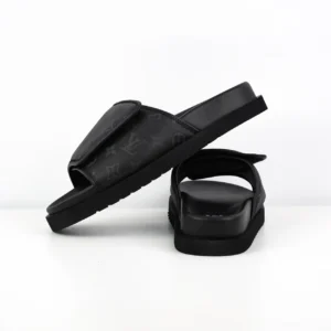 Louis Vuitton Voyager Mule black monogram leather slides with adjustable strap and rubber sole