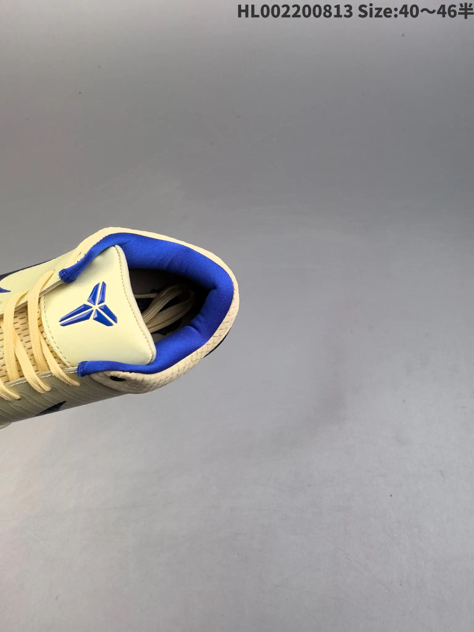 Nike Kobe sneakers cream blue textile leather upper with blue logo and padded ankle collar