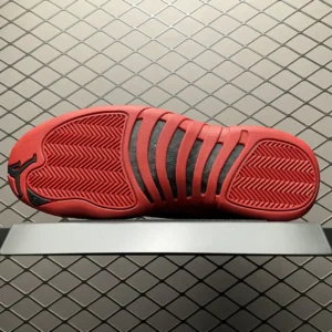 Nike Air Jordan 12 Retro red black rubber sole sneakers detailed tread pattern close-up