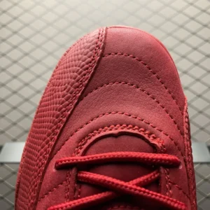 Nike Air Jordan 12 Flu Game red black leather and synthetic sneakers close-up toe view