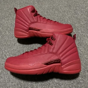 Air Jordan 12 Retro University Red leather sneakers with textured detailing and tonal laces