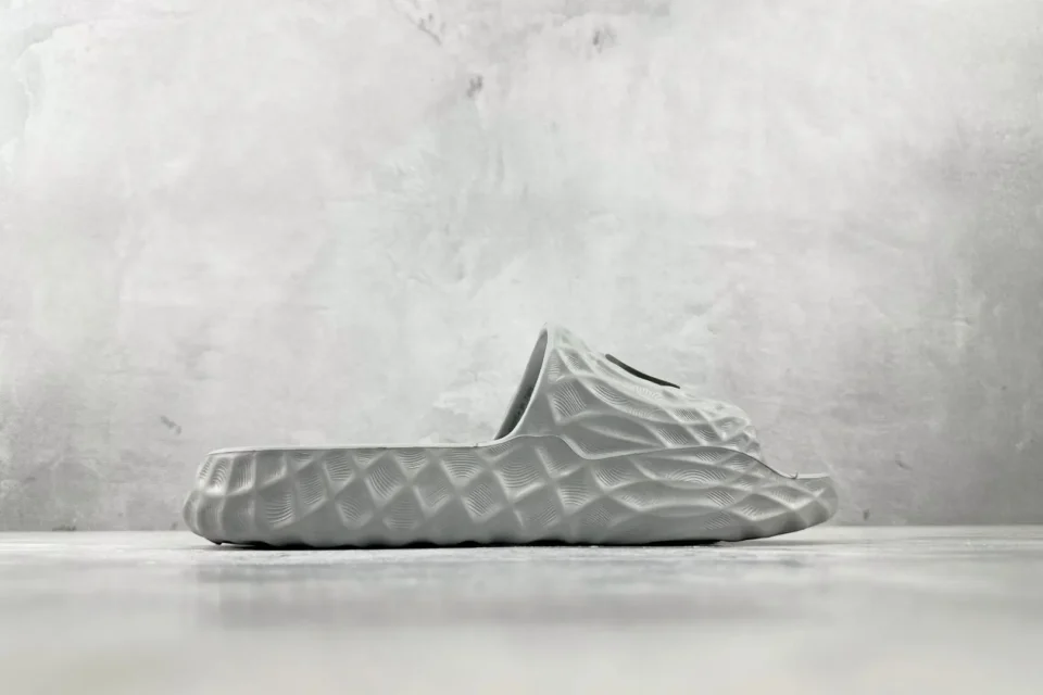 Adidas Yeezy Foam Runner Ararat solid grey EVA foam slip-on sneakers with textured pattern