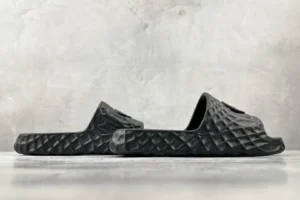 Adidas Adilette 22 black EVA foam slippers textured design