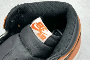 Nike Air Jordan 1 High OG Shattered Backboard black orange leather sneakers close-up logo detail