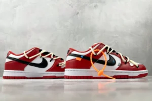 Nike Dunk Low Off-White Chicago red white black leather sneakers with orange zip tie accessory
