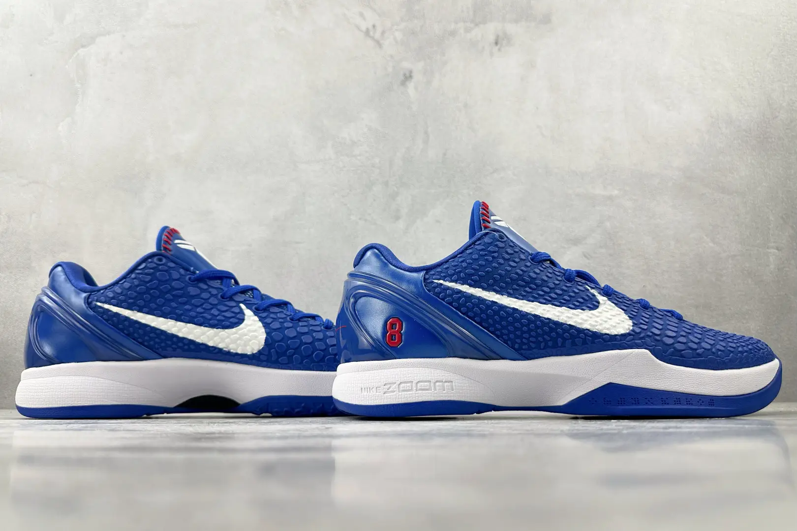 Nike Zoom Kobe 6 Protro blue white textured leather sneakers with red accents