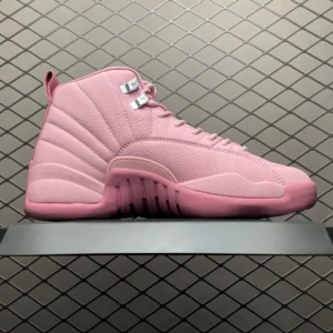 Air Jordan 12 Retro Pink Foam pink leather sneakers with silver eyelets and textured overlays
