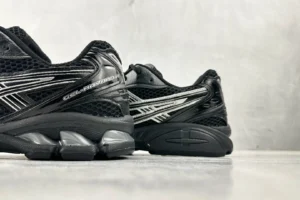 Asics Gel-Coffee 14 sneakers in black, showcasing detailed design and cushioning features, displayed on a neutral background for e-commerce product listing.