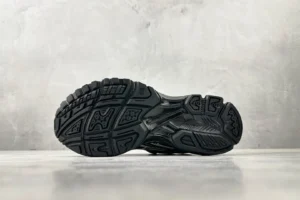 Asics Gel-Coffee 14 sneaker sole with intricate tread design, showcasing durability and grip on a neutral background.