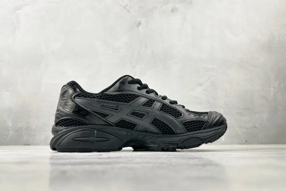 Asics Gel Kayano black colorway mesh and leather sneakers