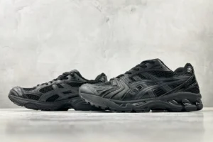 ASICS Gel-Coffee 14 sneakers in black, featuring a sleek design and textured upper, displayed on a neutral background.