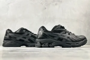 ASICS Gel-Coffee 14 sneakers in black, showcasing side view with textured upper and logo details, ideal for stylish athletic wear.