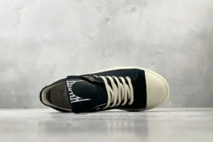 Dior B23 black white colorblock canvas sneakers with rubber sole and distinctive logo on tongue