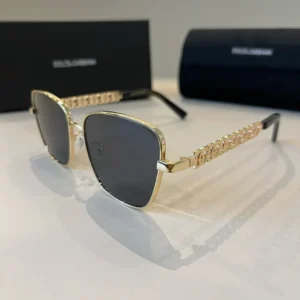 Dolce & Gabbana sunglasses gold frame black lenses metal chain temples luxury accessory