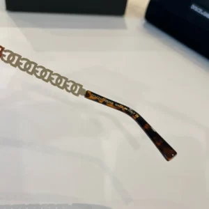 Dolce & Gabbana sunglasses tortoiseshell frame gold-tone metal DG logo temples accessory