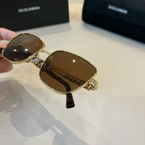 Dolce & Gabbana sunglasses square frame gold metal brown lenses acetate temples
