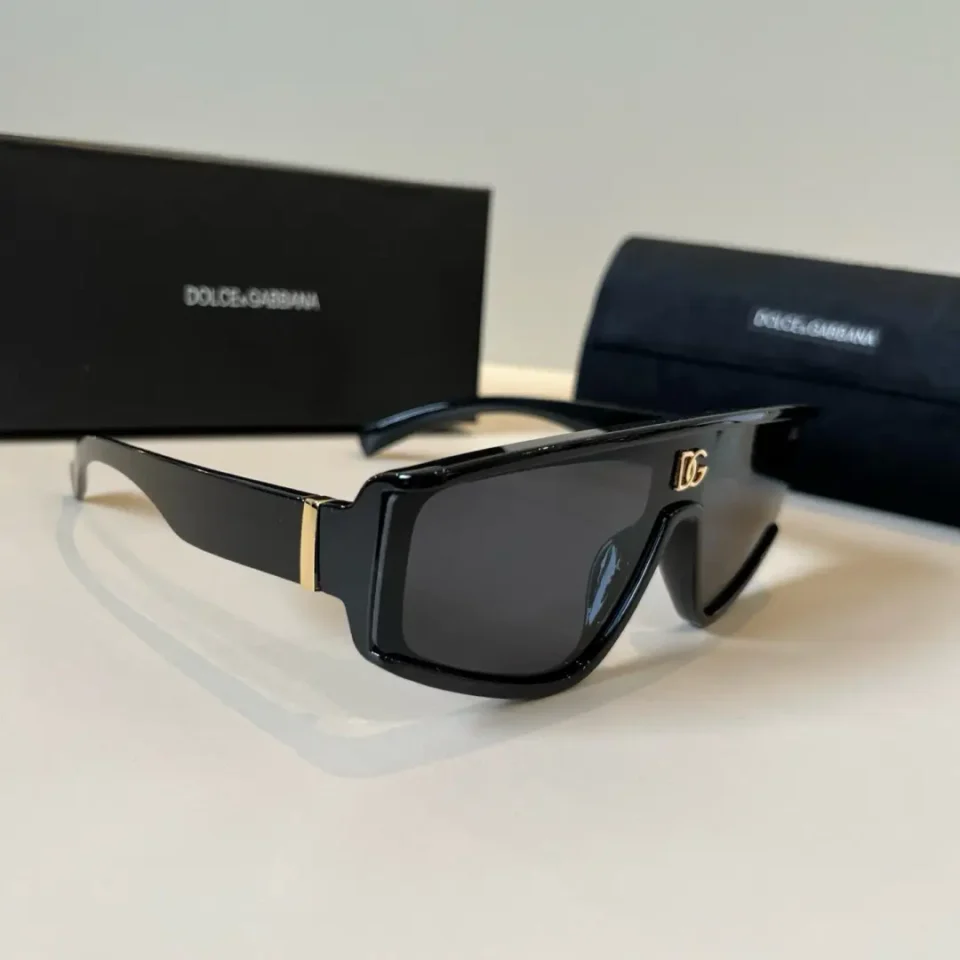Dolce & Gabbana sunglasses black acetate frame gold DG logo with black gradient lenses and black case