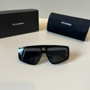 Dolce & Gabbana sunglasses black frame dark lenses gold DG logo with black branded case and box