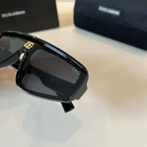 Dolce & Gabbana sunglasses black frame gray lenses acetate sunglasses with gold DG logo detail