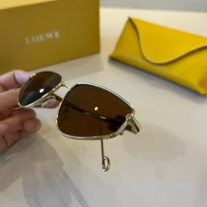Loewe sunglasses brown lenses silver metal frame luxury design with yellow leather case