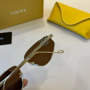 Loewe sunglasses brown lenses gold-tone metal frame luxury eyewear accessory with yellow case