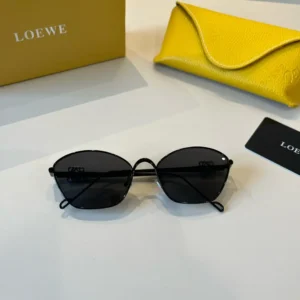 Loewe sunglasses black frame dark lenses lightweight metal accessories with yellow leather case and box