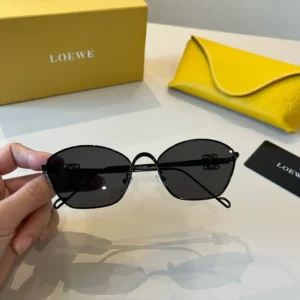 Loewe sunglasses black metal frame dark lenses lightweight accessory with yellow leather case