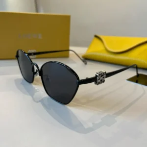 Loewe sunglasses black round lenses metal frame silver logo on temples