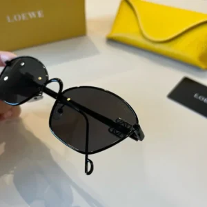 Loewe sunglasses black frame dark lenses metal accessories luxury design with yellow leather case