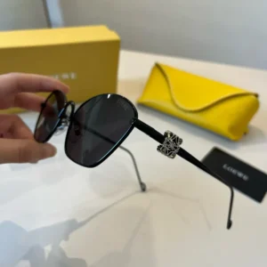 Loewe sunglasses black acetate frame dark lenses silver ornamental detailing accessory