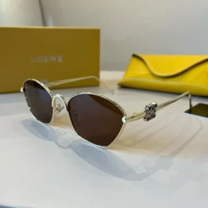Loewe sunglasses gold metal frame brown lenses with signature logo detail on temples